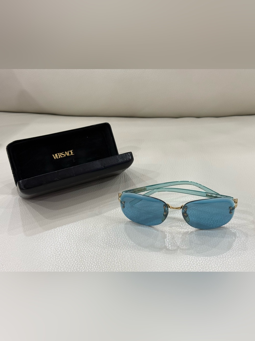 Vintage Versace Rimless Sunglasses with Blue Lenses and Gold Bridge